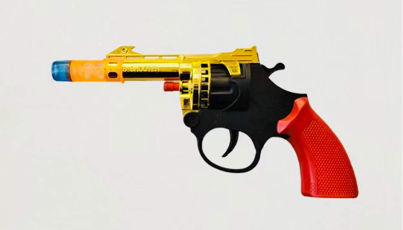 אקדח פיקות צבע (18סמ) זהב שקית888G/600/1-50