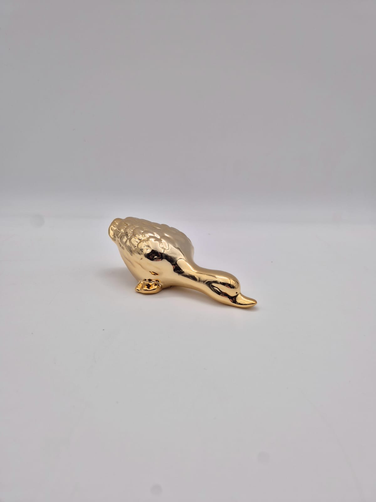 ברווז חרסינה זהב (120בקרטון)