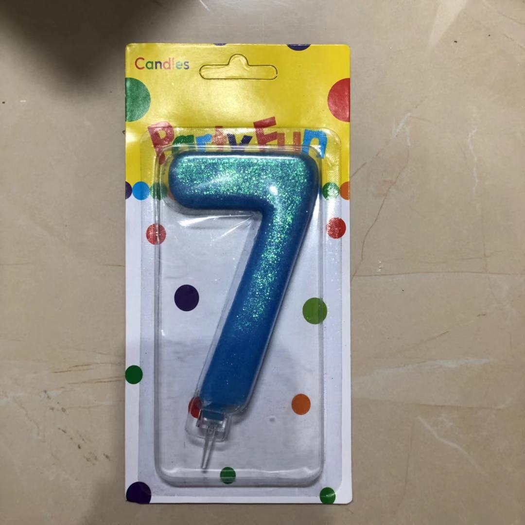 נר כחול נצנצים מספר 7  12 סמ
