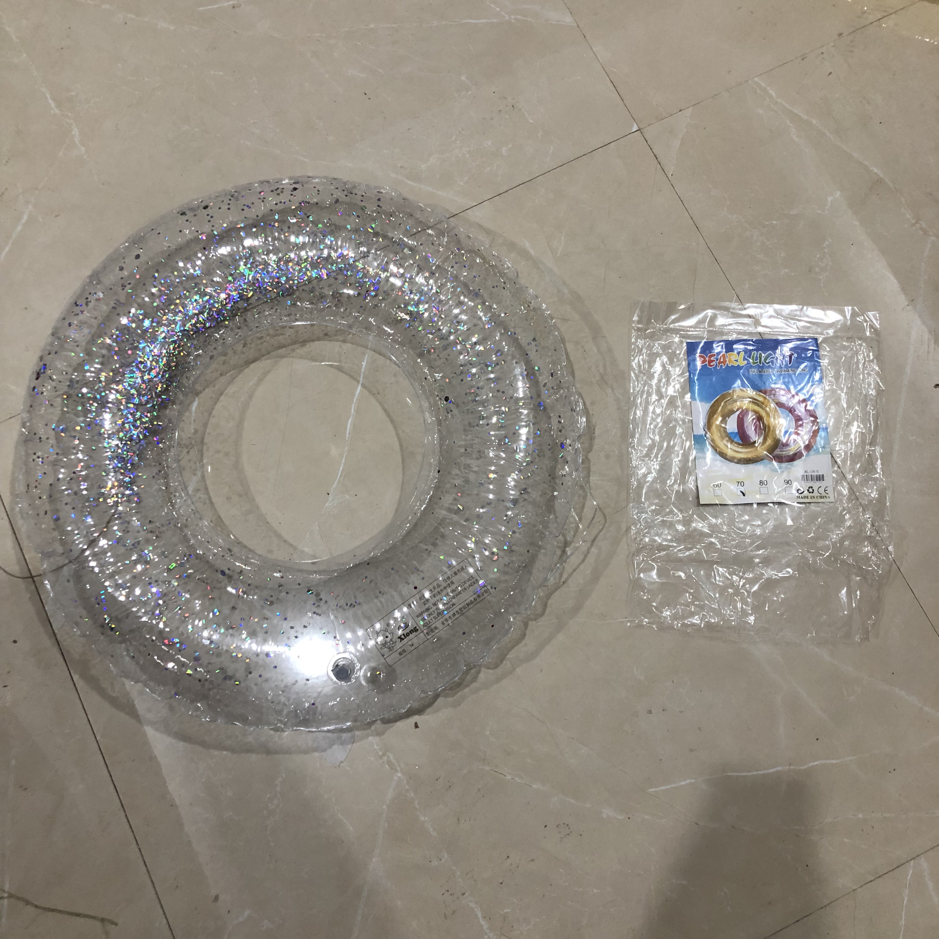 מתנפח - גלגל ים שקוף נצנצים כסף 70 ס"מ