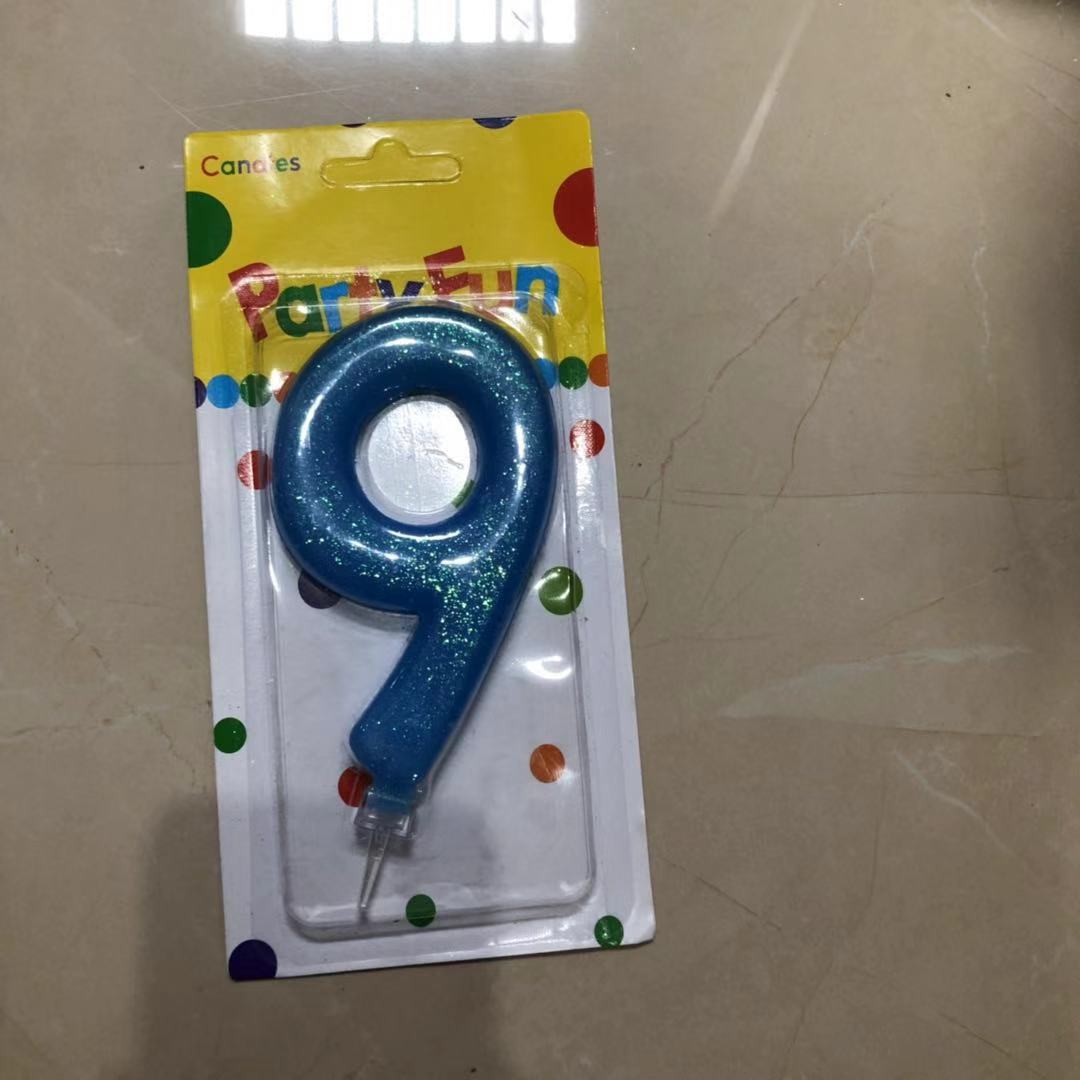נר כחול נצנצים מספר 9  12 סמ